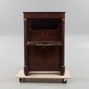 A empire chiffonier. First half of the 19th century.