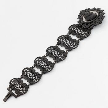A Berlin iron and steel bracelet with a cameo.
