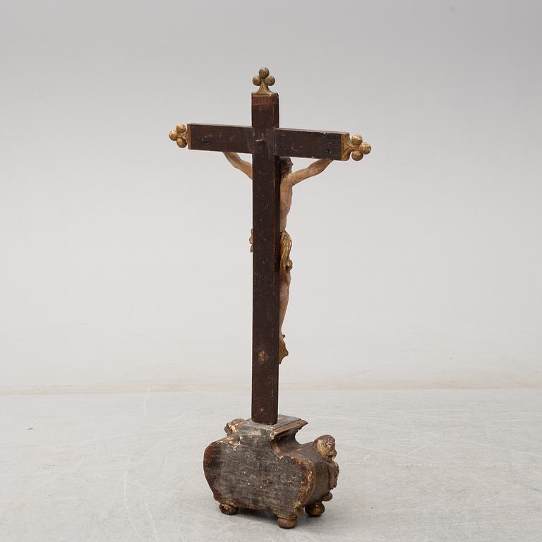 A 17TH CENTURY WOODEN CRUCIFIX, baroque.