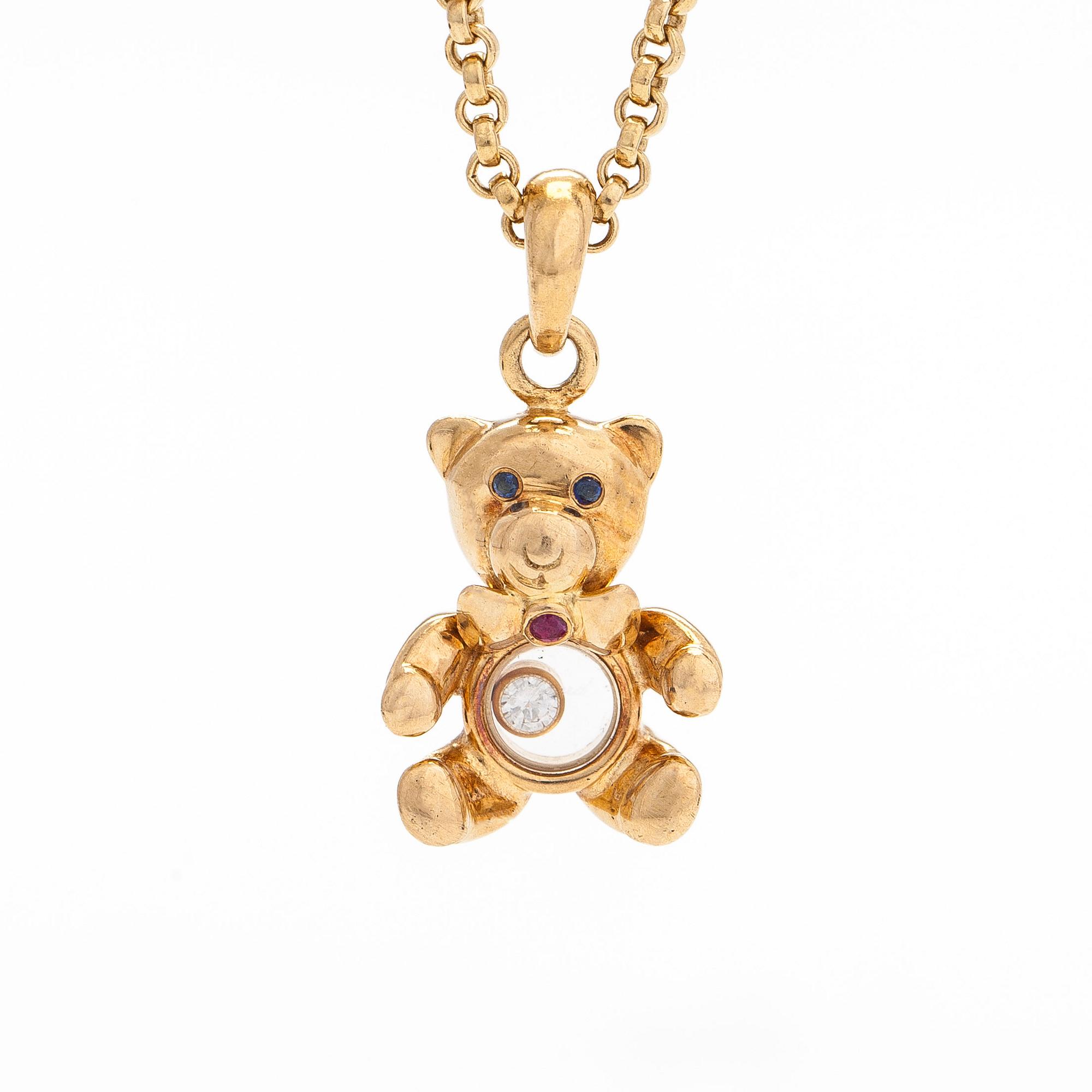Chopard, an 18K gold 'Happy Diamonds Teddy Bear' pendant necklace.