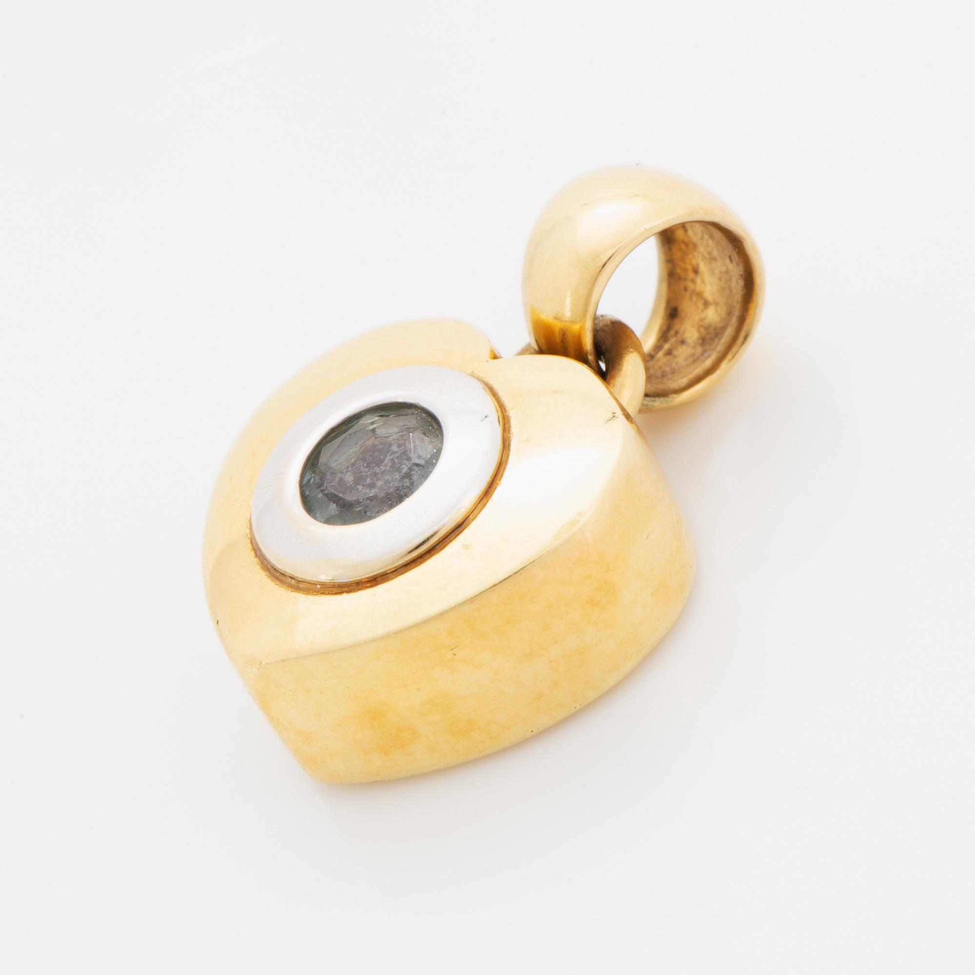 18K gold and blue stone heart pendant.