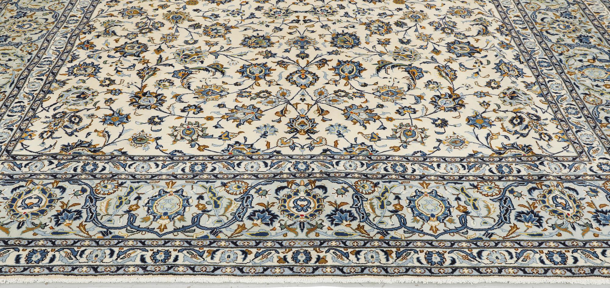 A Keshan carpet, 420 x 300 cm.