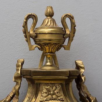 A brass wall clock marked A.W. Bruuns eftr, Lund from around year 1900.