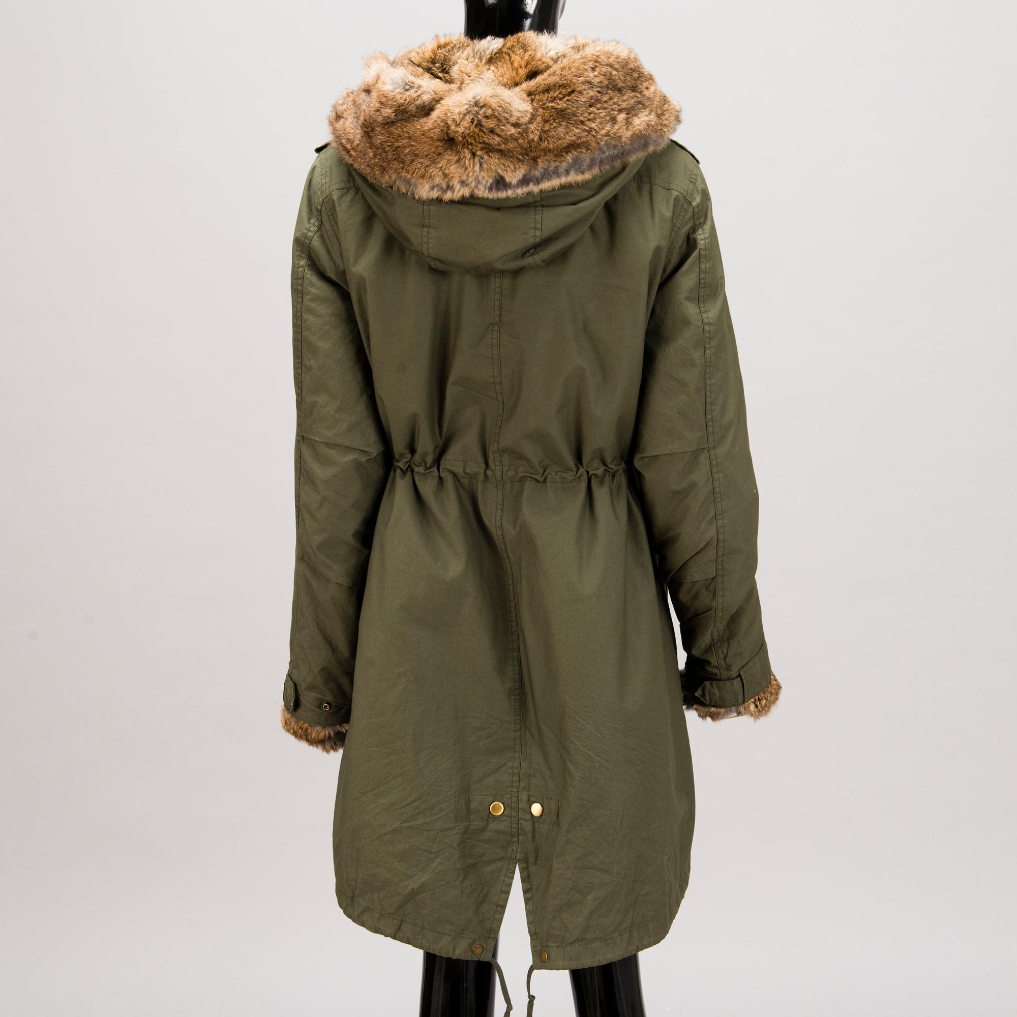 Ladies Woolrich Military Parka in size L.