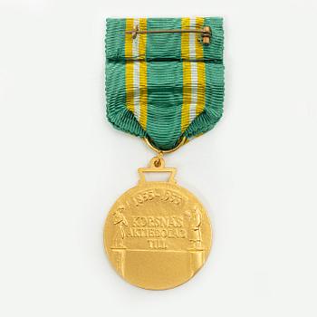 An 18K gold medal, Sporrong, Stockholm 1958.