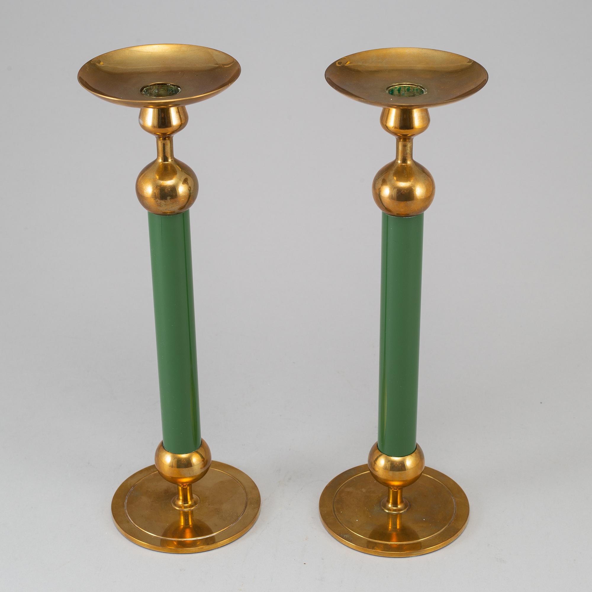 FIRMA SVENSKT TENN, a pair of Swedish 20th century  brass candlesticks marked Svenskt Tenn.