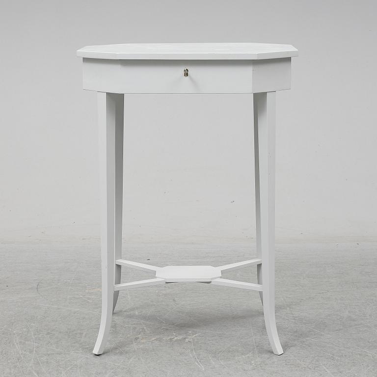 A ladys working table 20 th century.