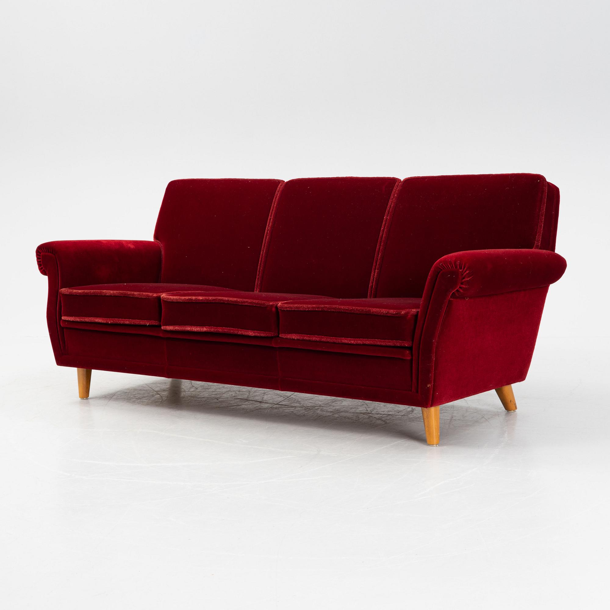 A velvet upholstered sofa, mid 20th Century.