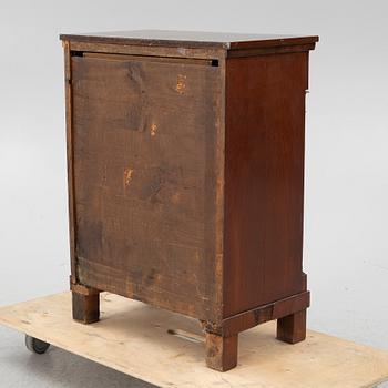 An Empire cabinet, first half of the 20th Century.