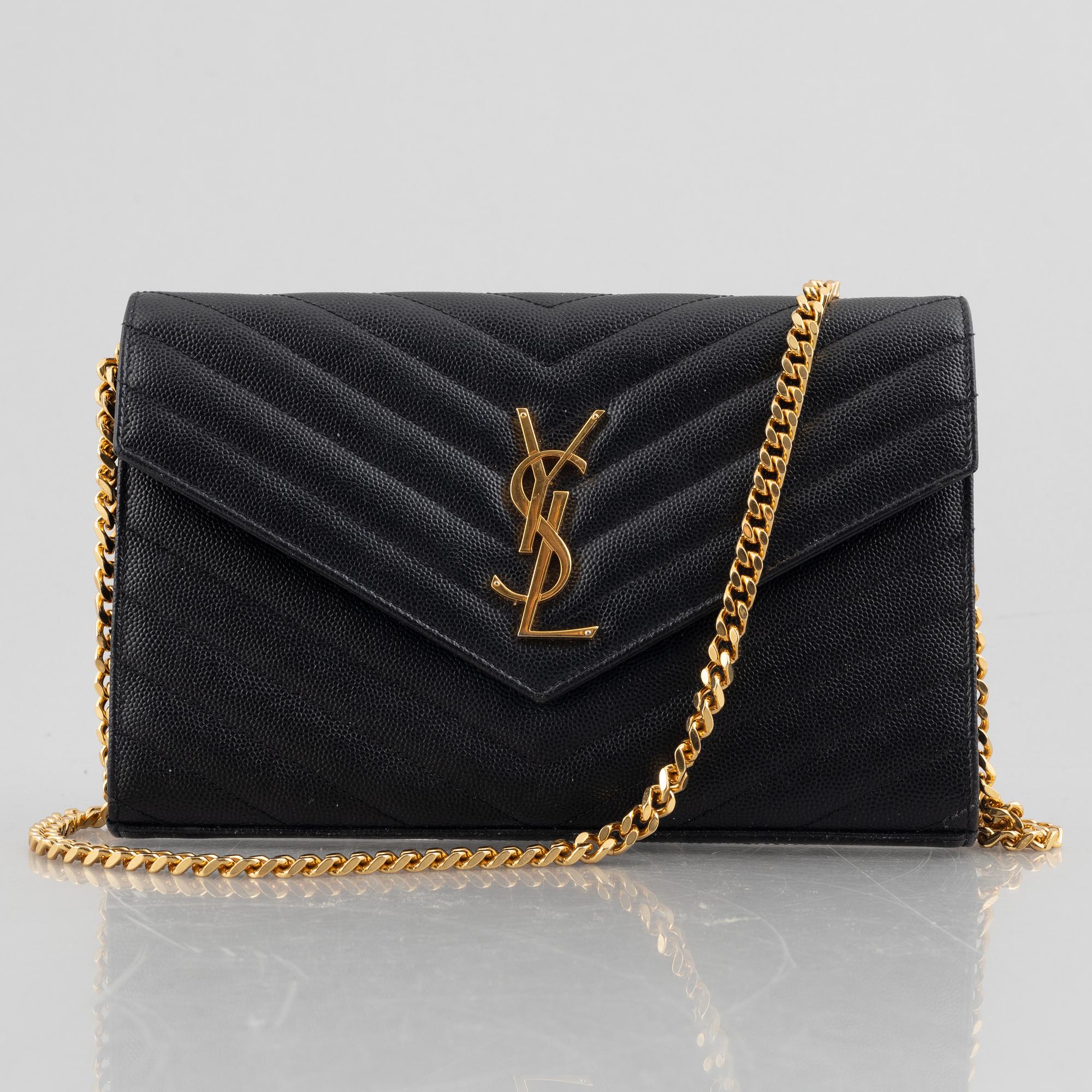 Yves Saint Laurent, a handbag/clutch.