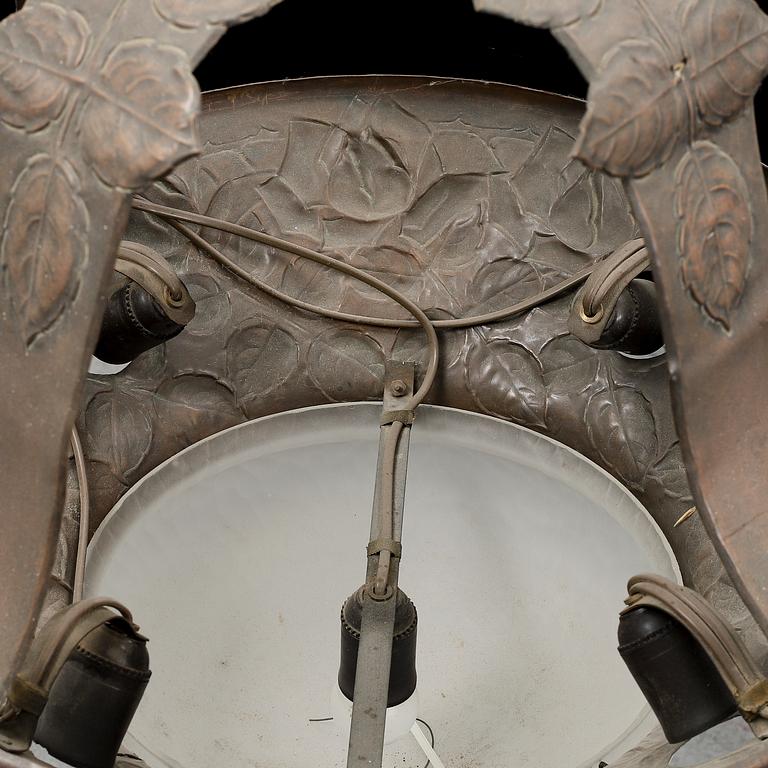 An early 20th Century art noveau copper ceiling light.
