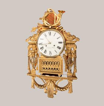 A gilded late Gustavian wall clock first half of the 19th century signed Jonas Cedelund.