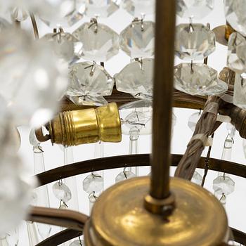 An Empire style chandelier, mid 20th century.