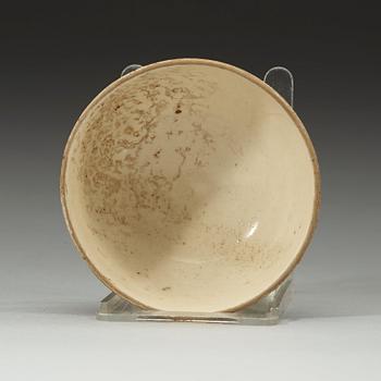 A white slip-covered and transparent glazed bowl, Song dynasty (960-1279).