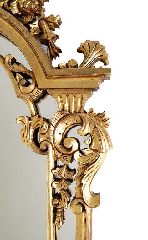 A rococo style mirror, second half of the 20th Century.