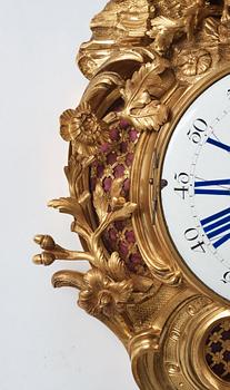 A Louis XV mid 18th century gilt bronze wall clock, "Chasse", in the style of J J de Saint Germain,