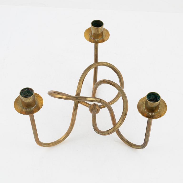 Josef Frank, a brass candelabrum, model 'Vänskapsknuten', Firma Svenskt Tenn, Sweden.