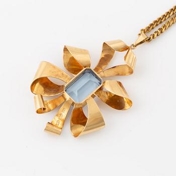 Pendant Stigbert 18K gold with blue stone, chain in yellow metal.