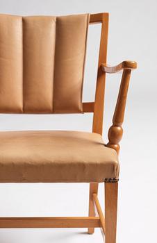 Josef Frank, a pair of mahogany easy chairs, Svenskt Tenn, Sweden 1940-1960s, model 2067.