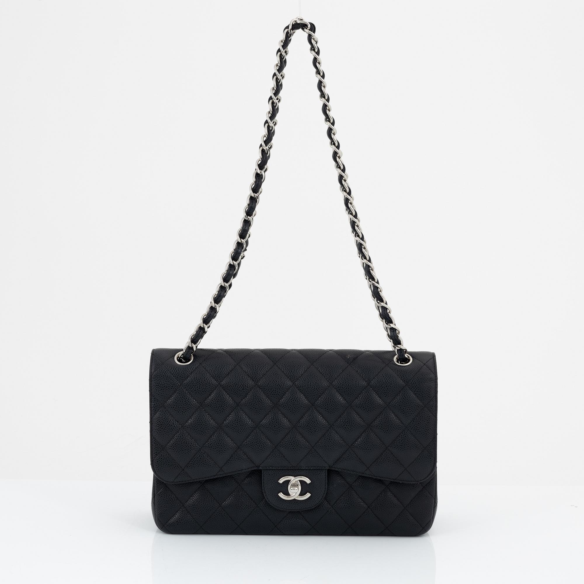 Chanel, a black caviar leather 'Double Flap Bag', 2013-14.