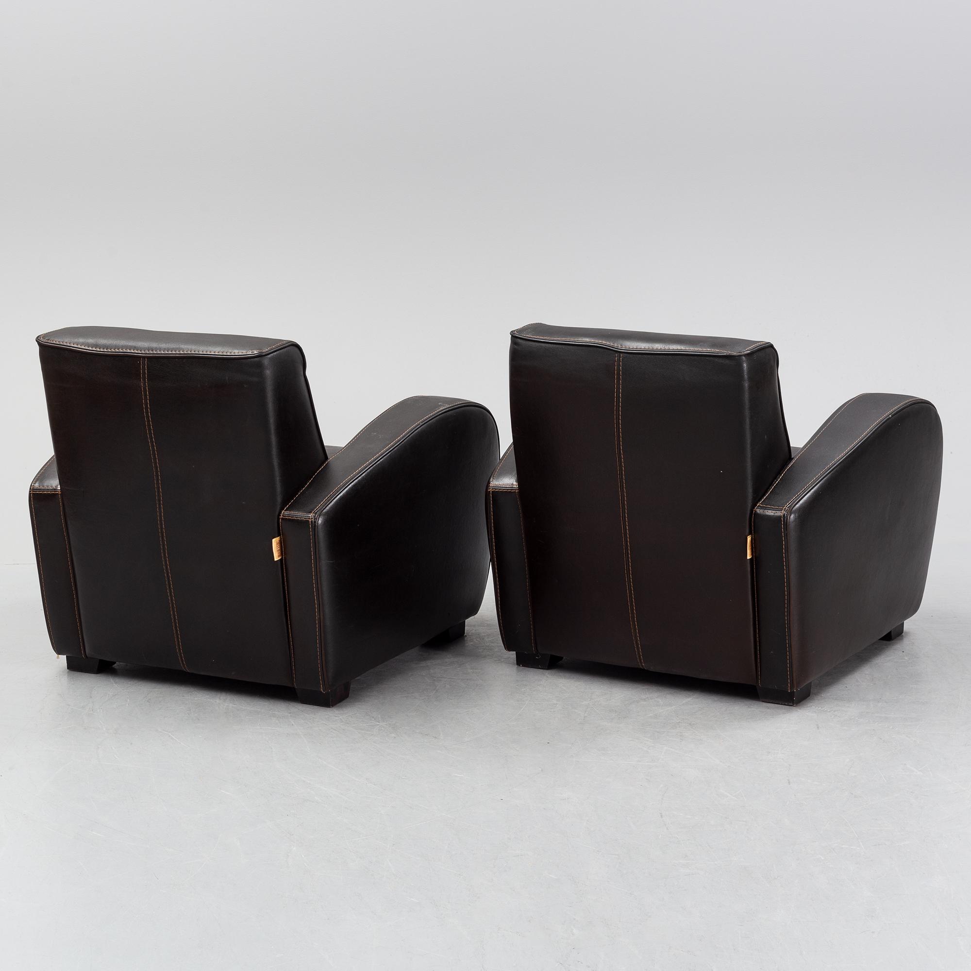 A pair of Italian leather armchairs from  Industria Divani e Poltrone, 21st-century.