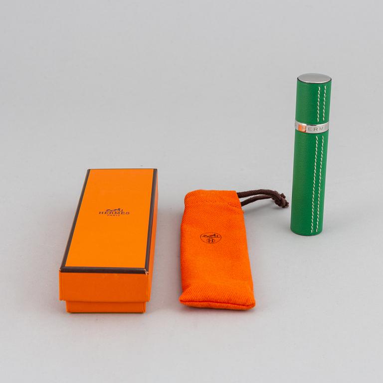 Hermès, refillable perfume bottle in leather.