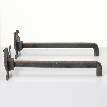 Anna Petrus, a pair of brass and iron andirons, Svenskt Tenn Sweden.