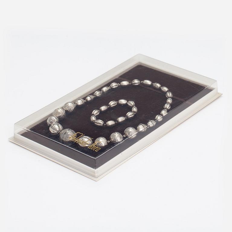 A set of sterling silver necklace and bracelet "Halikko treasure". Kalevala Koru, Helsinki 1967-72.