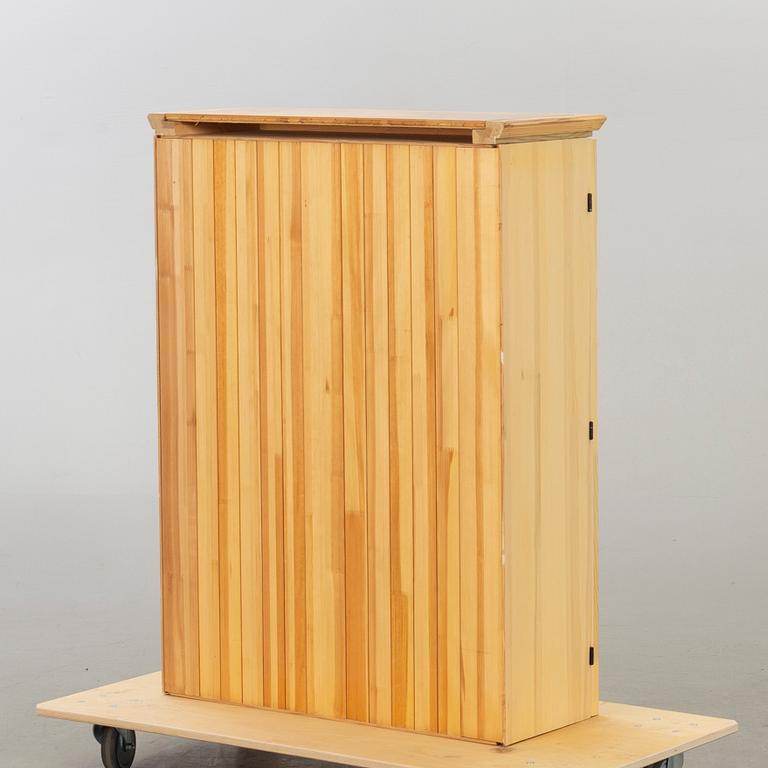 OLOF PIRA,  A CUPBOARD TOP "SOLID FORM".