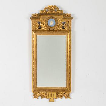 A Gustavian style mirror, circa 1900.