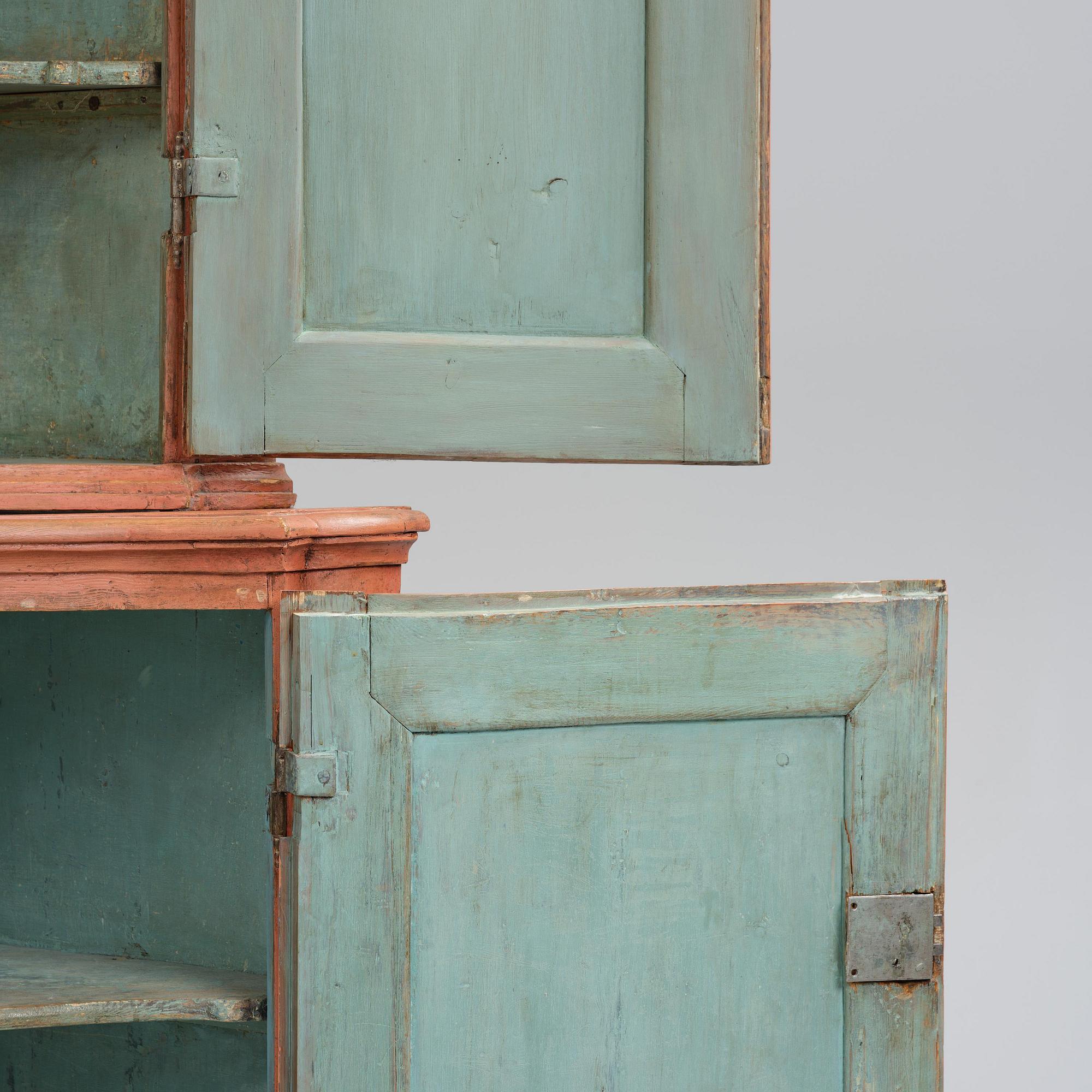 A rococo corner cabinet, later part 18th century.