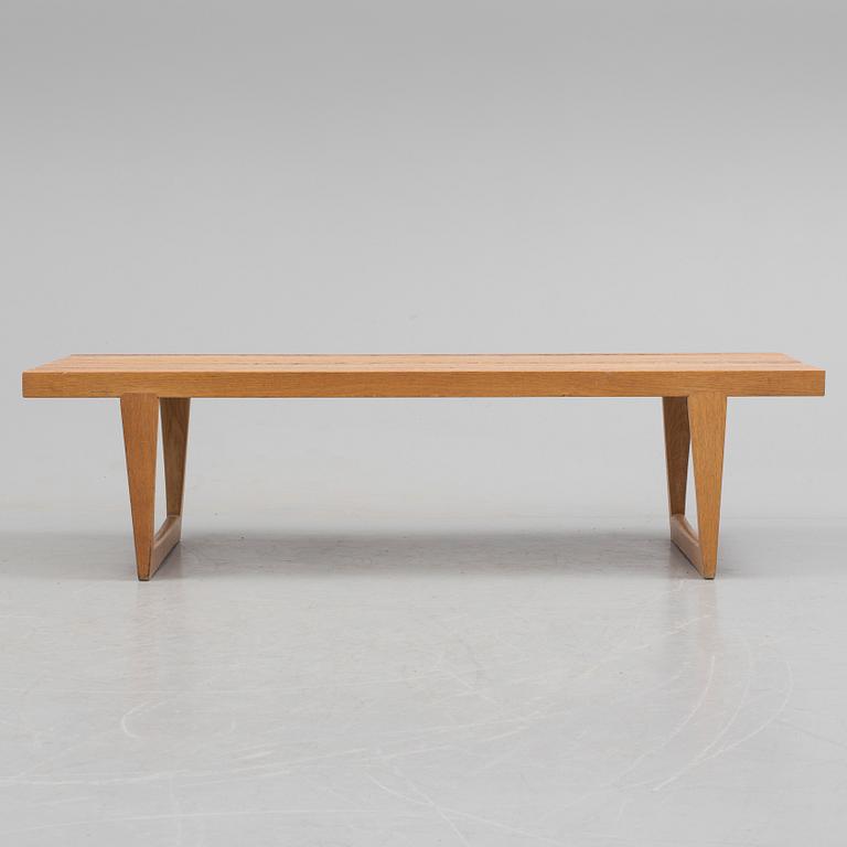 A "Tokyo" bench by Yngvar Sandström for NK.