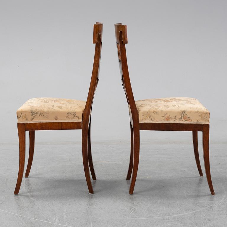 A pair of Royal Empire chairs, first half of the 19th Century.