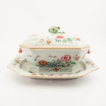 A Chinese famille rose tureen with cover and plate later part of the 18th century.