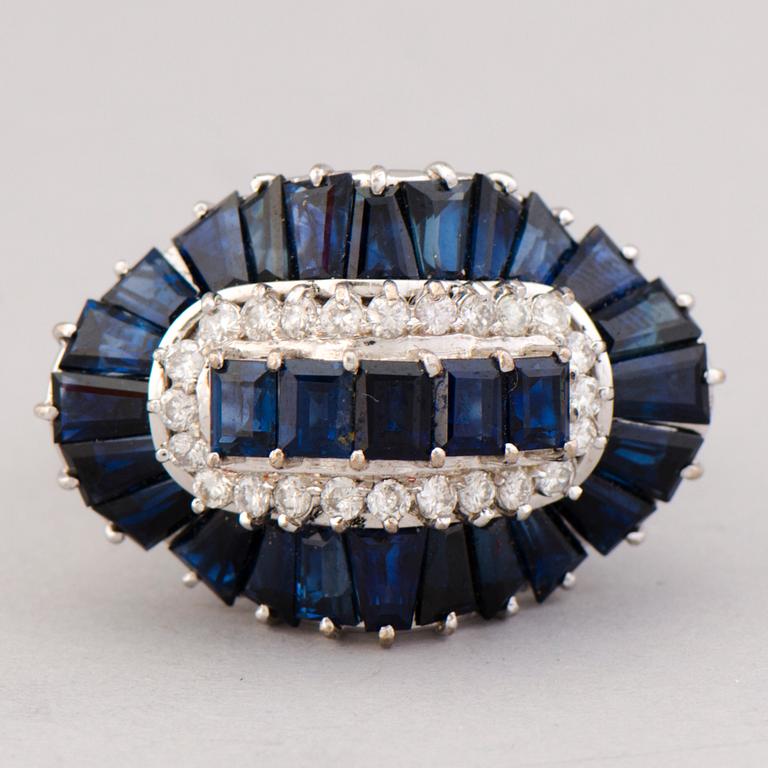 A RING, baguette cut sapphires, brilliant cut diamonds, 14K white gold.