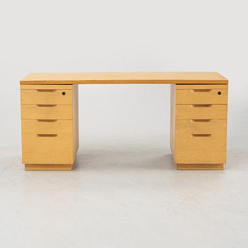 Alvar Aalto, a birch writing desk for Artek, Finland, second half of the 20th century.