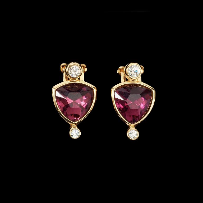 A pair of earrings by Christian Dior.