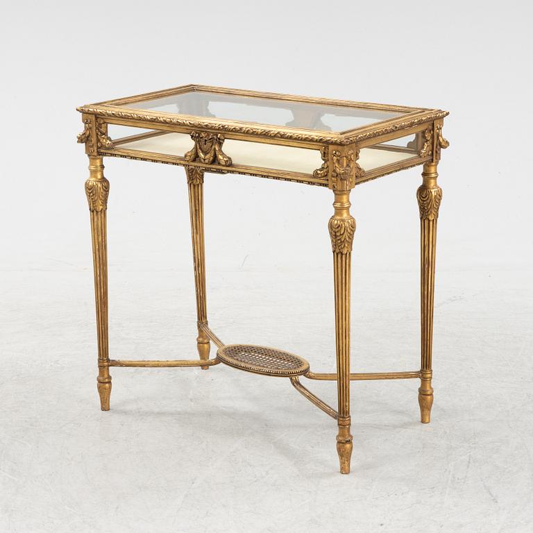 A bronzed display table, early 20th Centiury.