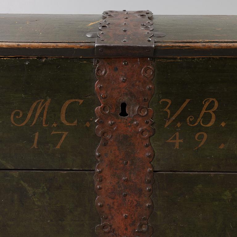 A folk art chest, dated 1749.