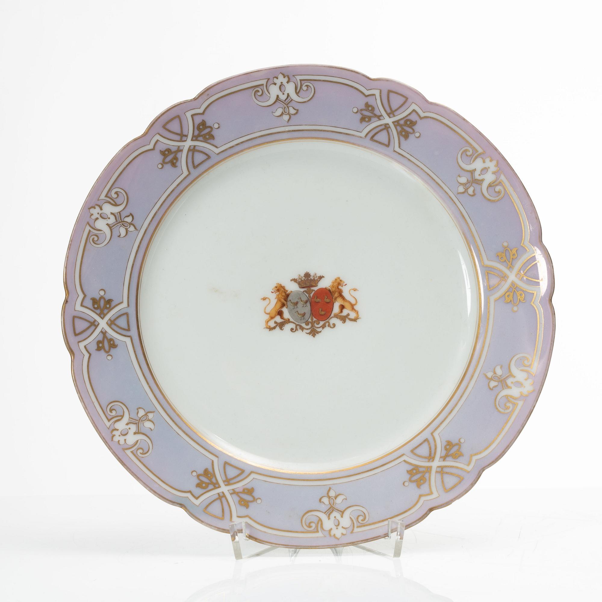 A group of three armorial dinner plates, presumably France, late 19th century.