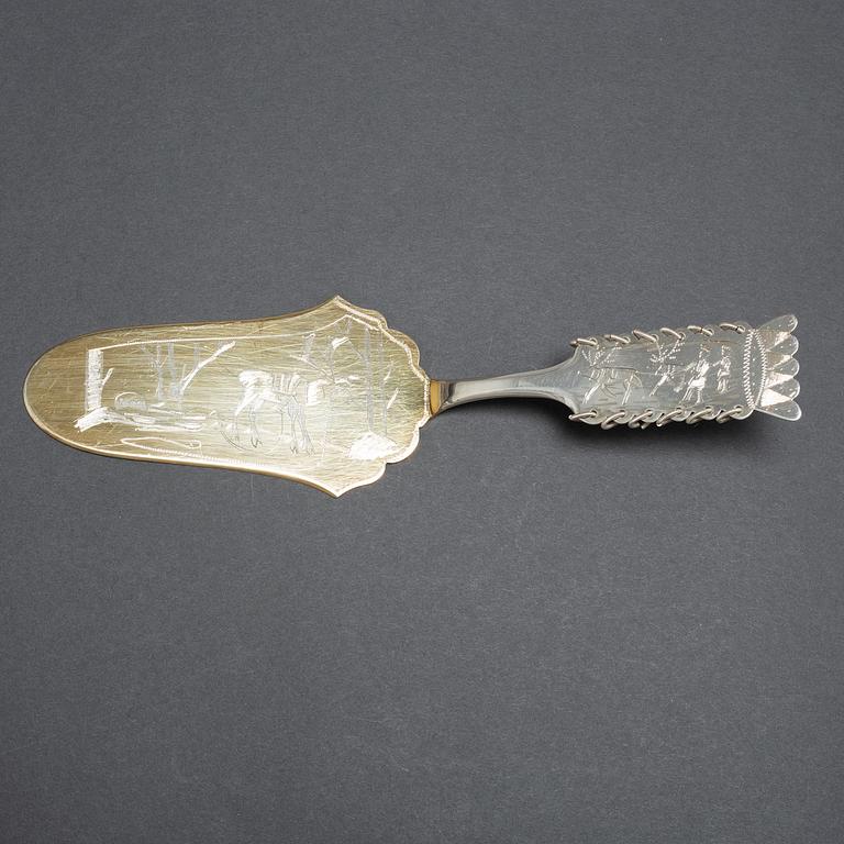 A SILVER CAKE KNIFE AND 12 COFFEE SPOONS, samian, second half of the 20th century.