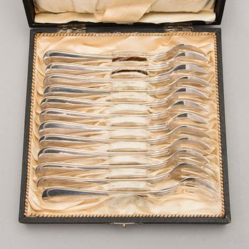A SET OF 12 OYSTER FORKS, plate. Miele & Co.