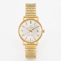 Tissot, Seastar Seven, 18K gold with bracelet in 18K gold, 34 mm.