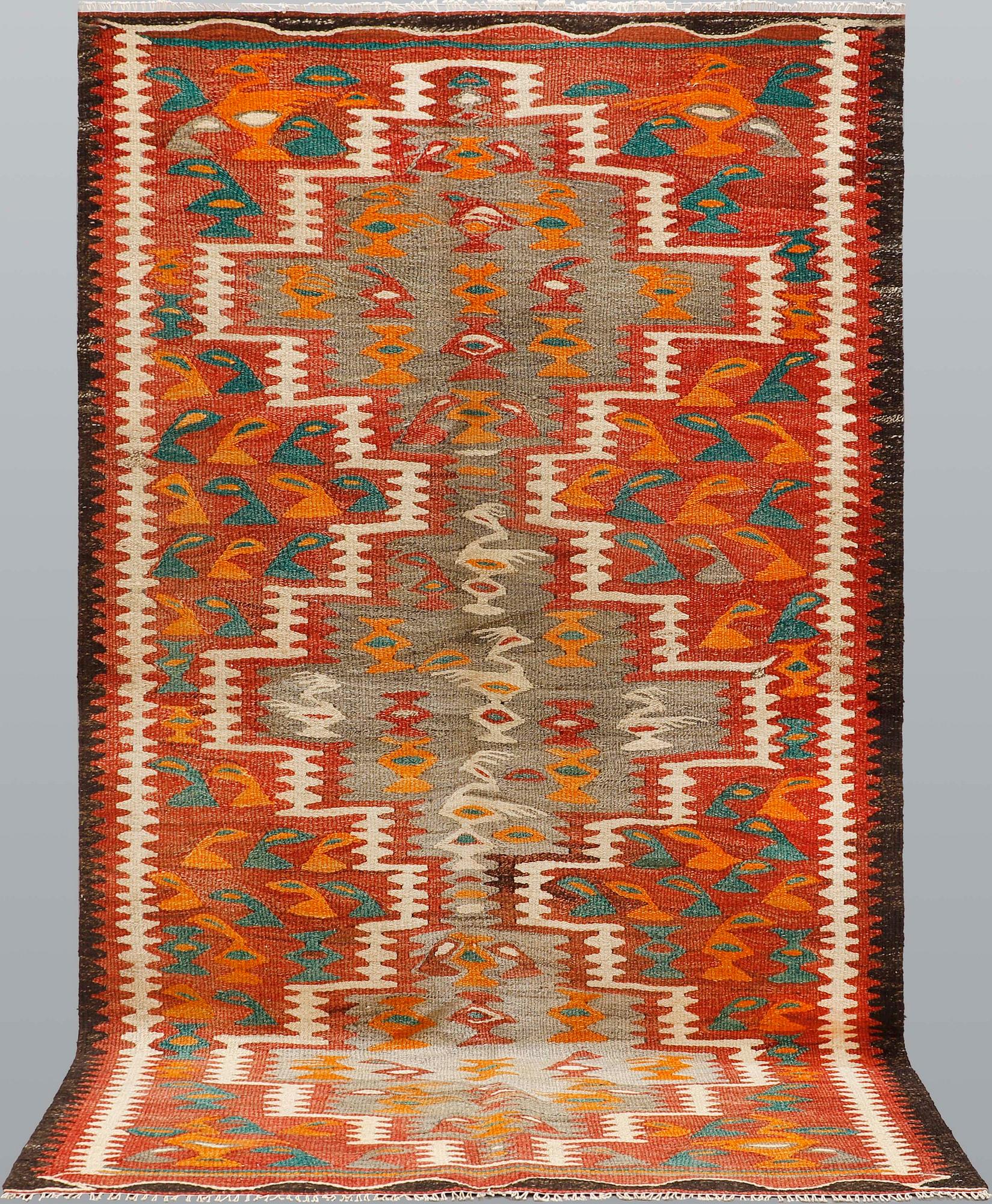 A Nomad Kilim rug, approx. 255 x 150 cm.