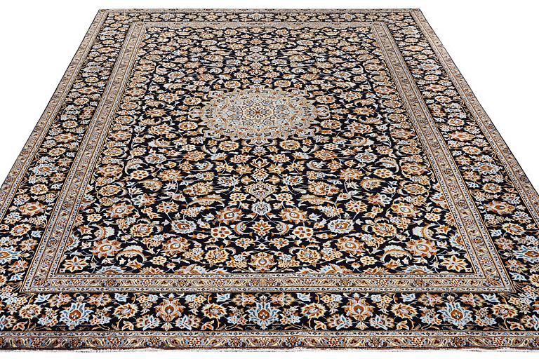 A carpet, Kashan, c. 403 x 297 cm.