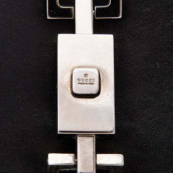 A Black Leather Jackie Bag.