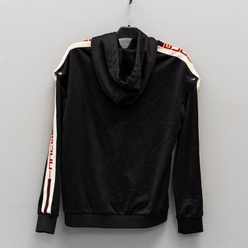 GUCCI, a polyester t-shirt and hoodie.