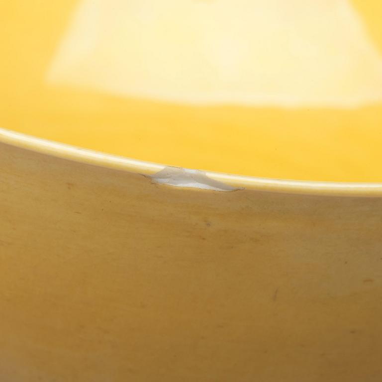 A yellow glazed bowl, Qing dynasty with Daoguang mark.