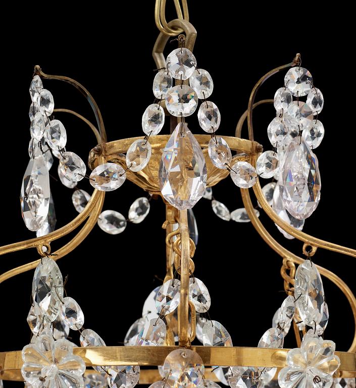 A Gustavian-style 19th/20th Century six-light chandelier.
