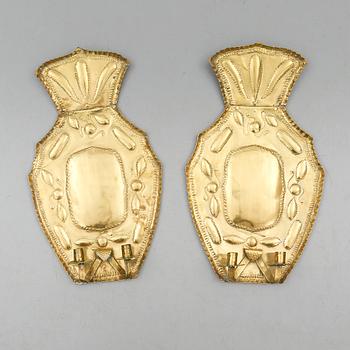 VÄGGLAMPETTER, 1 par, mässing, omkring år 1900.